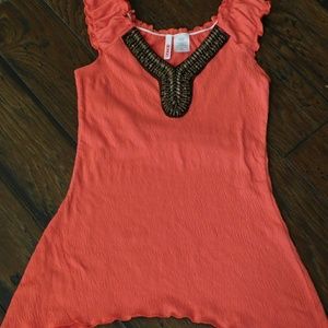 A cute Bongo top with beading along Ne